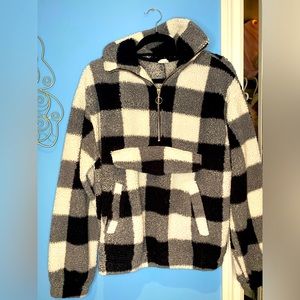 Woman’s fluffy plaid shirt